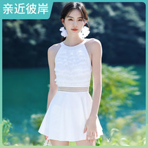 香港高端裙式连体平角游泳衣女性感保守显瘦遮肚小清新仙女范泳装
