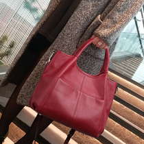 牛皮包包女款酒红色水桶包大容量女士手提包时尚高级感单肩斜挎包